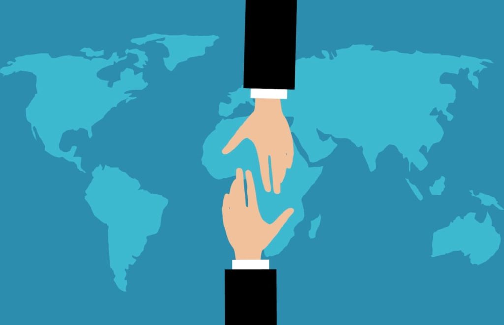 Global Handshake for Non Profit Teamwork
